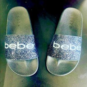 White and black Bebe slides for women. Brand new.
